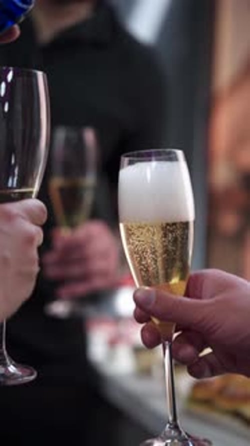 Pouring Sparkling Champagne for Celebration Event