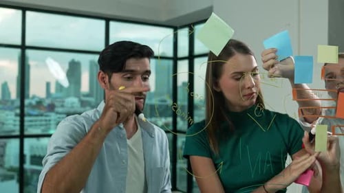 Business Team Collaborating and Brainstorming Ideas in Office