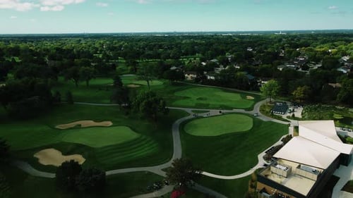 Aerial drone tilt down shot over a Golf Club in Northbrook, Illinois, USA at daytime.