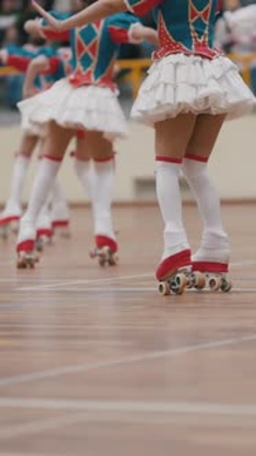 Synchronized Roller Skating Team Performing on Rink