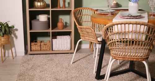 Dining Room With Table And Chairs And Shelf
