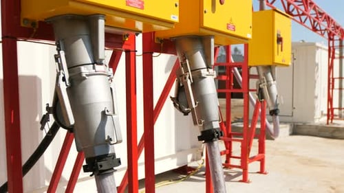 Industrial Power Distribution Equipment with Yellow Boxes