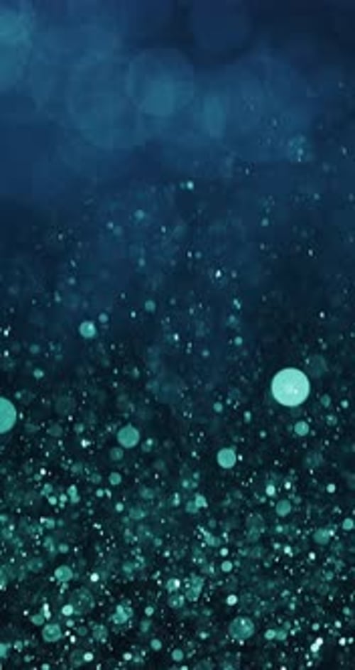 Ascending Glittering Cyan And Green Particles