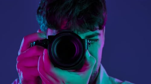 Backstage Photographer in Studio Shooting with Camera