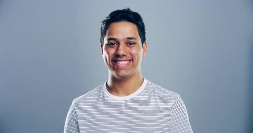 Happy Man Making Heart Shape with Hands