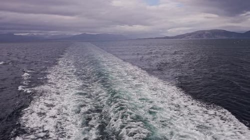 Cruise Ship Leaves Trail in Sea Close Up