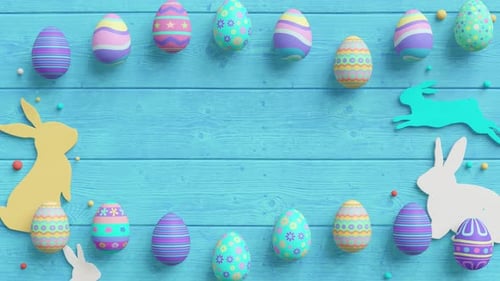 Easter eggs and rabbit silhouettes on a turquoise wooden background with scattered beads.