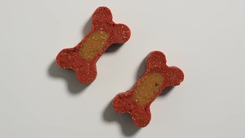 Rotating Dog Treats. Treats for dogs on a white background. Dog food close up.