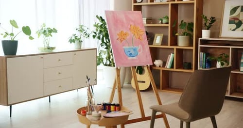 Canvas, art and empty studio in home with furniture, painting and creativity in morning with color