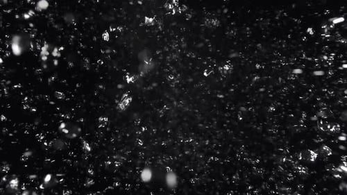 Underwater bubbles mayhem on Black Backgrounds. Illuminated bubbles motion. Ocean floor bubbles. Rea