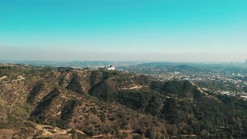 Wide Aerial Footage Over Hills and Mountains Near Los Angeles California on Sunny Day