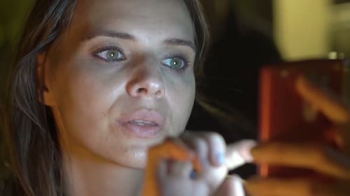 Woman Texting on Rooftop Bar Terrace