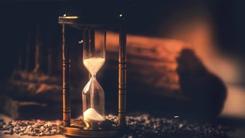 Dramatic Lighting on Antique Hourglass Timer