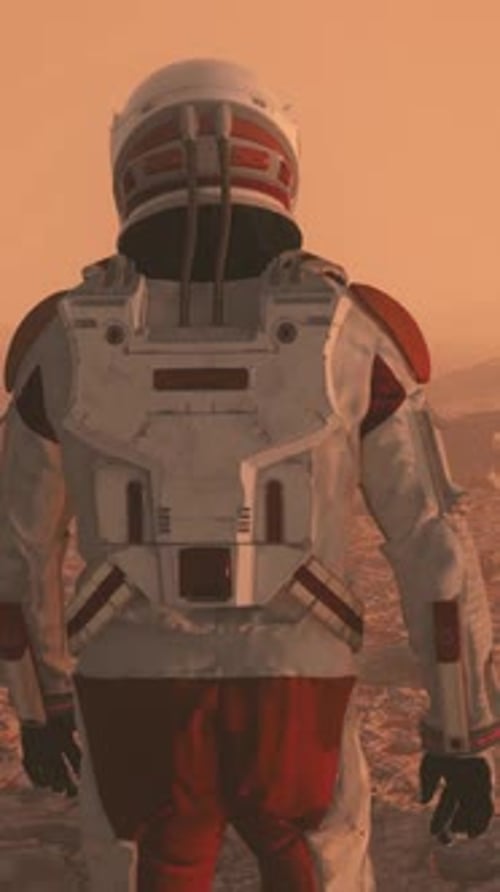 Astronaut wearing space suit walking on the surface of mars.