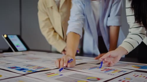 Business Team Analyzing Data in Modern Office