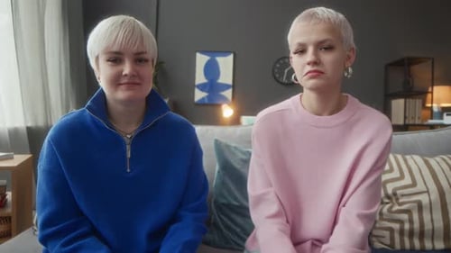 Two Young Adults Using Sign Language