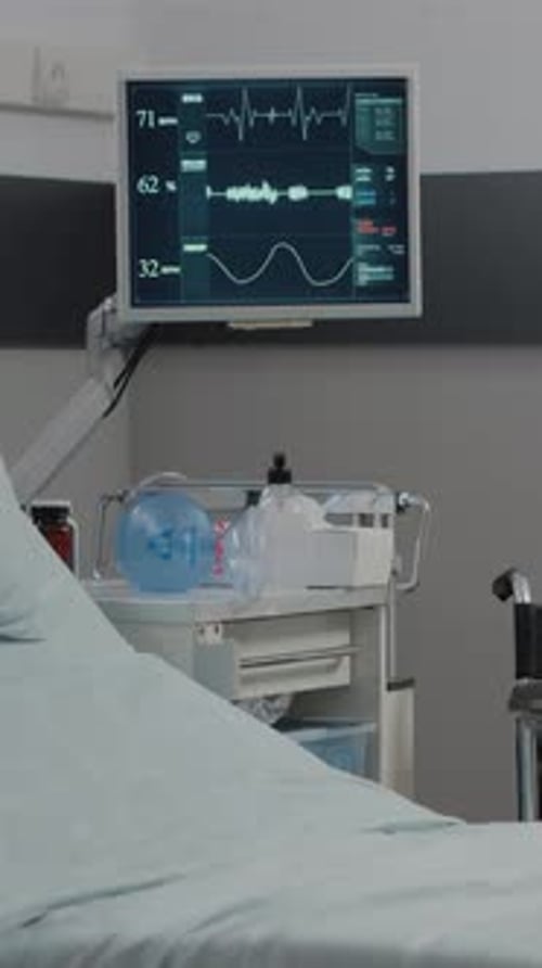 Vertical Video Empty Hospital Ward with Heart Rate Monitor and Bed