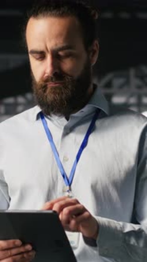 Vertical Video Server Room Technician Next to Coworkers Reviewing AI LLM Visualization