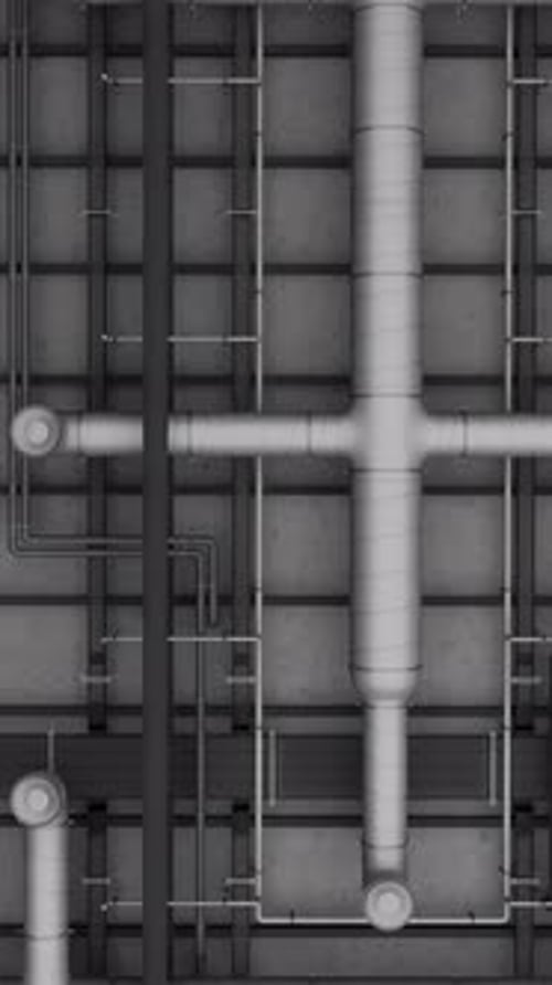Electrical and ventilation systems, connections with cables and metal pipes inside a modern building