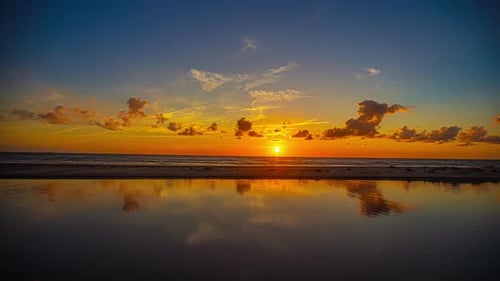 Timelapse Of Golden Sunlight Over Seascape During Sunset Till Sunrise.