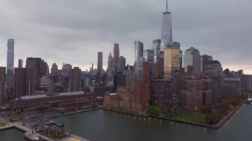 Lower Manhattan Skyline View Featuring One World Trade Center Towering Above Twilight Clouds Near