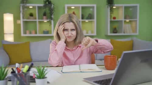 Young university student girl who is tired of studying.