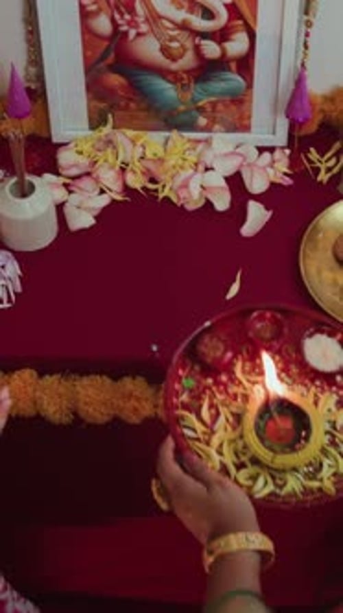 Woman Holding Diwali Prayer Offering at Home