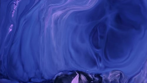 A churning purple and pink sea