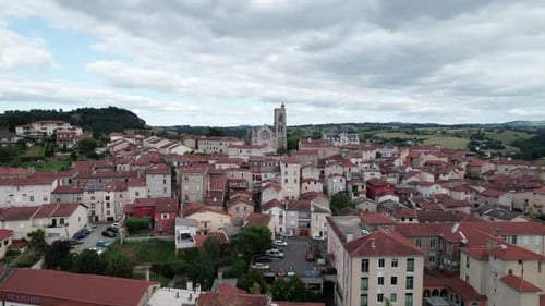 drone shot going backward over Saint Galmier in Loire Departement, the city is known to be home of B