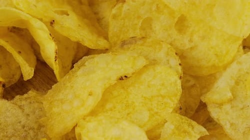 Potato chips rotating close up.