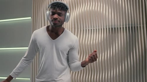Dancing Listening Music African American Man in Headphones Enjoy Sound Stereo Good Quality Modern