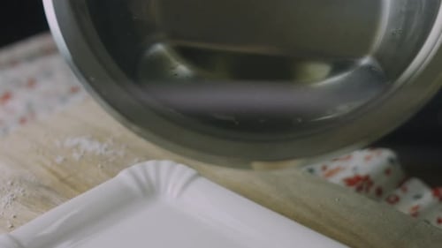 Water Pouring into Pan in the Kitchen