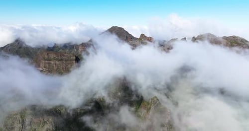 Clouds Over Rugged Mountains Of Pico do Areeiro, Madeira Island, Portugal.