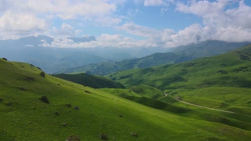Rolling Green Hills Landscape Aerial View