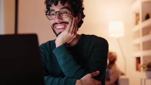 Young Adult Video Chats Smiling and Laughing