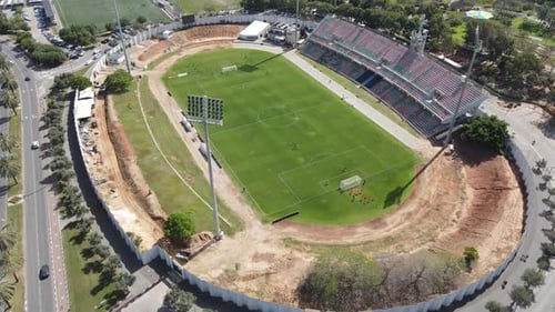 Aerial video of soccer players playing in the stadium, Kfar Saba Israel