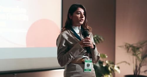 Conference, speaker and business woman with presentation on leadership development in office