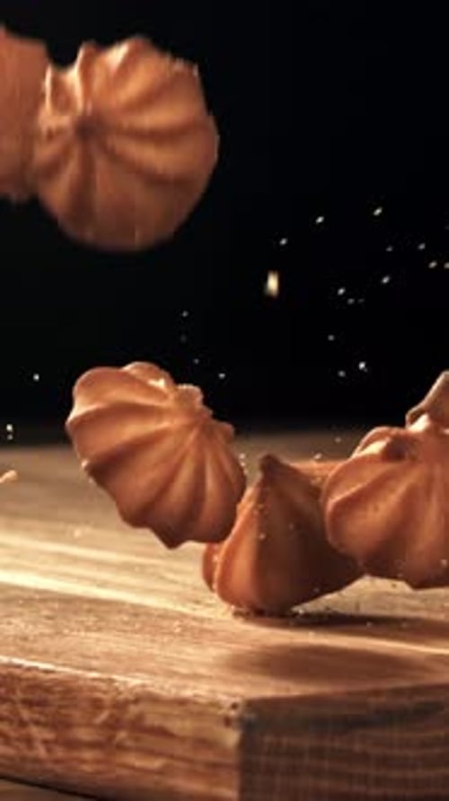 Cookies Fall on a Wooden Table Filmed on a Highspeed Camera at 1000 Fps