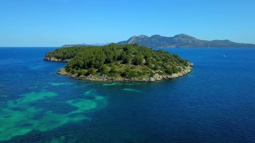 Stunning Aerial View of Tropical Island in Turquoise Blue Ocean