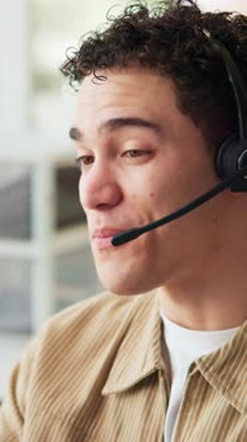 Call center consultant, speaking and man in office for trip reservation, booking holiday or smile
