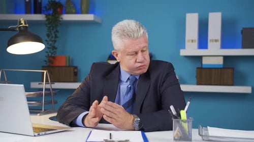 Man Working at Desk in Modern Office