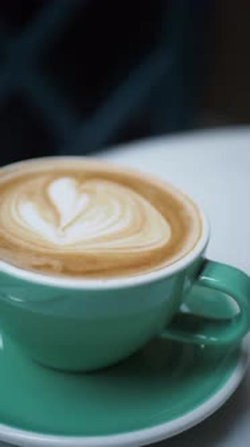 Latte Art in Turquoise Cup