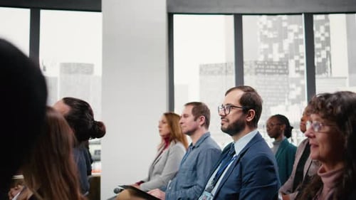 Diverse Group Attends Corporate Conference in City Office