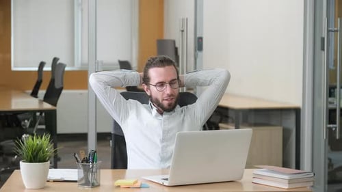 Businessman Sitting on His Office