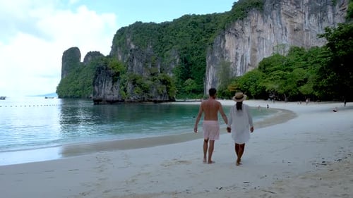 Couple Men and Women on a Tropical White Beach in Thailand Koh Hong Island Krabi