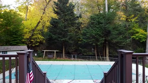 Winterized Pool in fall. Shown in suburban yard.