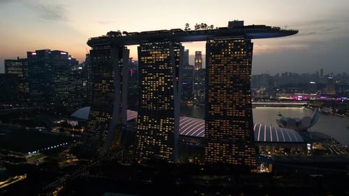 Night drone shot of Marina Bay Sands Hotel in Singapore