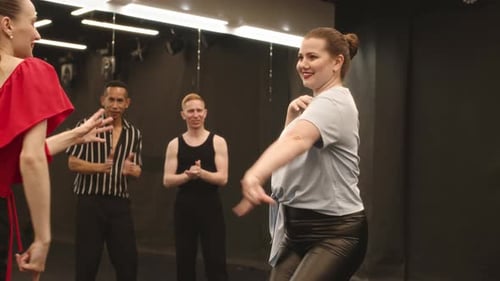 Girls Dancing Latina in Ballroom
