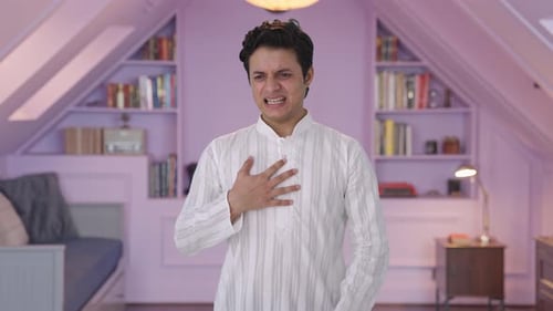 Sick Indian man having acidity attack