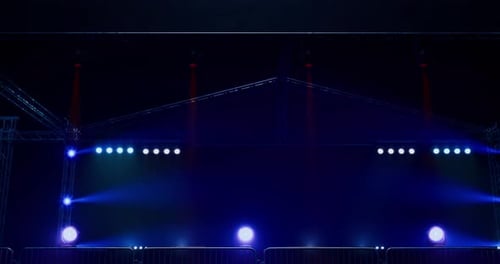 Dynamic Stage Lighting Background with Flashing Red and Blue Beams